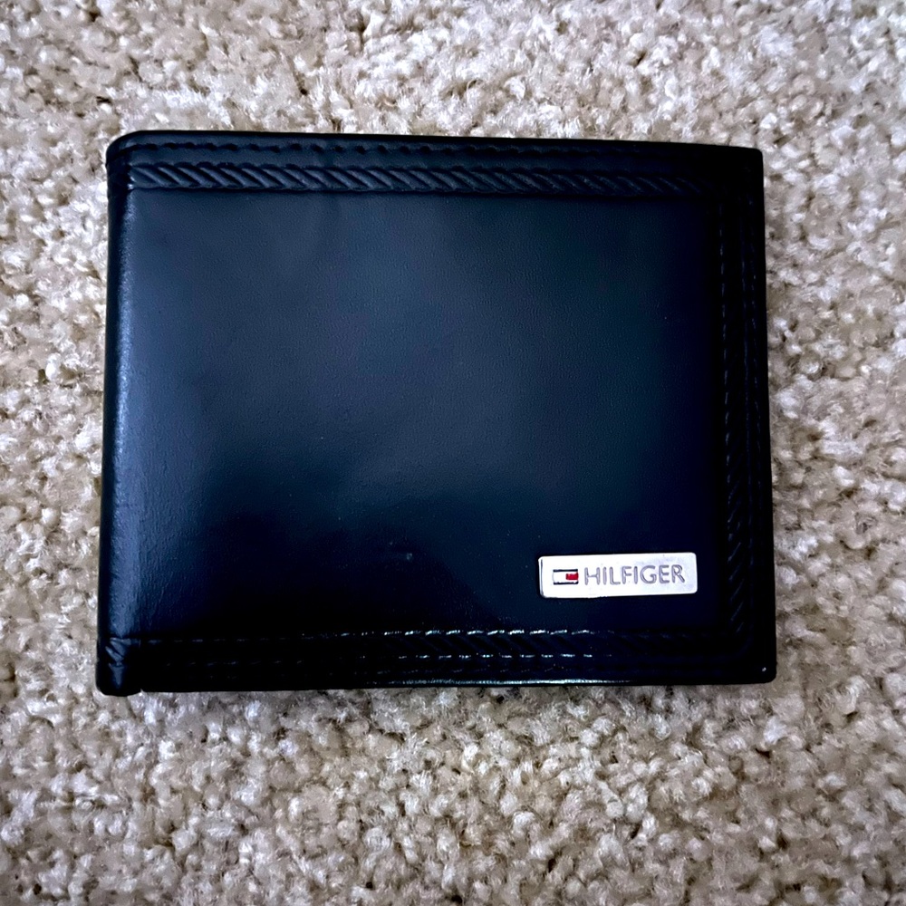 Gently used black Tommy Hilfiger men’s wallet